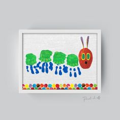 the very hungry caterpillar is on display in a white frame with polka dots