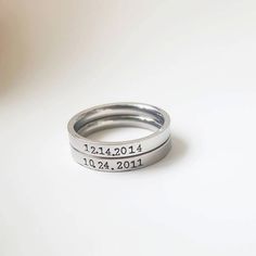 Name Date Ring Stacking  Wedding Date Ring Birth date Stackable Ring Staking Ring Bridesmaid Ring Kid Rings Mommy Ring Family  Personalized Wedding Date Birth date Ring Name Ring Stackable Ring Staking Ring Bridesmaid Ring Kid Rings Mommy Ring Family  Personalize your ring with a name OR a date OR initials. 3mm stainless steel ring hand stamped letter by letter. The listing is for one ring. Personalization can only be done on the outside of the ring. All Personalization details must be provided Kid Rings, Wedding Ring With Name, Aquamarine Engagement Ring Vintage, Date Ring, Bridesmaid Ring, Word Ring, Stamped Ring, Pink Morganite Engagement Ring, Bridesmaid Rings