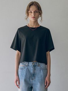 This is vanone atelier’s crop t-shirt is made from premium combed cotton, offering a high-density fabric that maintains its shape despite its lightweight feel. Ideal for the hot summer months, it drapes smoothly over the body, providing a relaxed fit that doesn’t add bulk to your silhouette. Versatile for styling, it can be worn on its own with various pants or layered under light shirts or cardigans for different looks.- Ideal for daily wear- Can be paired with different bottoms to create various looks- A basic item that complements any outfit well Boxy Short Sleeve Cropped Shirt For Everyday, Black Boxy Fit Cropped T-shirt, Black Boxy Cropped T-shirt, Black Boxy Fit Crop Top With Short Sleeves, Everyday Boxy Fit Short Sleeve Crop Top, Everyday Boxy Fit Crop Top With Short Sleeves, Boxy Short Sleeve Crop Top For Everyday, Basic Crop Top T-shirt, Basic Everyday Crop Top T-shirt