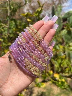 Purple beaded bracelet with San Judas charms for protection. San Judas also provides hopes in times of need. ✨ Purple Beaded Crystal Bracelet For Friendship, Hand Wrapped Crystal Bracelet With Round Beads For Friendship, Latina Bracelet Aesthetic, Spiritual Beaded Charm Bracelet For Friendship, Purple Beaded Bangle Bracelets For Friendship, Spiritual Purple Beaded Bracelets For Friendship, 108 Beads Friendship Bracelet Jewelry, 108 Beads Friendship Bracelet, Spiritual Wrap Bracelet With Faceted Beads As Gift