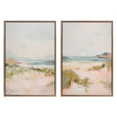 two paintings on the wall, one with an ocean view and one with sand dunes