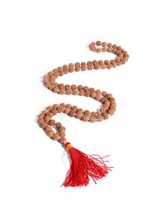 This set of Prayer Beads, a Mala or Rosary, is made of finely selected, peppercorn sized, five Mukhi Rudraksha mala beads. Thread-knotted in traditional style with red tassel, this Rudraksha rosary is best for doing Japa or chanting mantras to all deities. You may keep the healing mala in your puja altar for positive vibrations or as a garland for your deity idol. You may also wear it around your neck. It is best to avoid wearing this with other Rudraksha combinations. Measures 34 inches long wh Red Mala For Meditation With Round Beads, Red Round Beads Mala For Meditation, Red Mala With Round Beads For Meditation, Gemstone Beads Mala For Puja And Festivals, Hand-strung Red Mala As A Gift, Red Mala With 108 Beads For Puja, Red Beaded Mala For Meditation, Red Mala For Meditation, Red Hand-strung Mala For Festivals