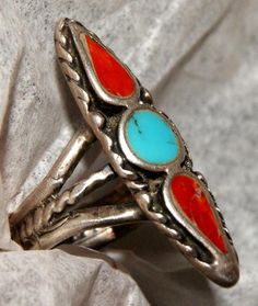 Old Pawn Zuni Dishta Ring, hand-wrought & flush stones of turquoise & coral. Traditional spearhead design. Triple shank with braid work. Oxblood Coral & Sleeping Beauty Turquoise teardrops. Unmarked sterling silver. Good Vintage Condition. SIZE:  6 FACE:  1-1/8" X 3/8" WEIGHT:  5.9 Grams FREE WORLDWIDE SHIPPING No Refunds/No Returns. Sales fund my Homestead for animals I adopt who are rescued from Indian Reserves by Volunteer Vets for 20+yrs. No More Chains, cold, hunger or misery. All are spayed/neutered. There are many like me that take these poor animals to our hearts and homes. FOR THE LOVE OF ANIMALS "The man who kills the animals today is the man who kills the people who get in his way tomorrow."    -Dian Fossey Womens Rings, Cowgirl Bling, Navajo Style, Zuni Jewelry, Ring Turquoise, Red Bird, Punk Jewelry, Red Jewelry, Hippie Jewelry