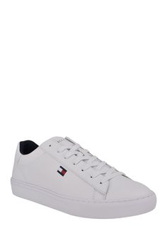 The Brecon sneaker is a modern footwear essential that's sure to get compliments.Sizing: True to size. M=standard width. Round toe with bumper. Lace-up vamp. Lightly cushioned footbed. Padded collar. Signature flag logo. White sole. ImportedThis item cannot be shipped to Canada. Tommy Hilfiger Leather Sneakers For Streetwear, White Leather Tommy Hilfiger Sneakers, Tommy Hilfiger Sneakers With Rubber Sole And White Sole, Tommy Hilfiger Sneakers With White Rubber Sole, Tommy Hilfiger Sneakers With Rubber Sole, Tommy Hilfiger High-top Leather Sneakers, Tommy Hilfiger Leather High-top Sneakers, Tommy Hilfiger Sporty Sneakers, Tommy Hilfiger Leather Sneakers