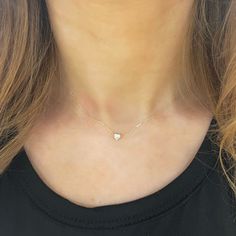 A delicate 18k Gold chain houses a diamond heart pendant that glimmers and gleams along the neck. Give it as a gift or wear it yourself, we know you'll adore the Lover Diamond Heart Necklace! An adjusting sliding bead allows the option for versatile lengths of wear with the longest length of 17". The intentional delicacy of this design makes for the heartfelt gift of a child's first piece of fine jewelry or an adult's everyday dainty wear. Try pairing this with our Lover Diamond Heart Bracelet. Diamond Heart Necklace, Diamond Heart Pendant Necklace, 18k Gold Chain, The Lover, Heart Necklace Diamond, Big Diamond, Heart Shaped Diamond, Heart Pendant Diamond, Bridal Bands