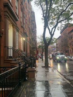 an empty city street in the rain