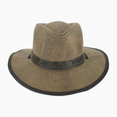 'The Buckthorn is well suited to the adventurous soul who craves a rugged hat for outdoor exploring. Made of waxed cotton that repels moisture, the Buckthorn is an outback safari style that features a vented modified teardrop crown for air flow. Trimmed with a faux leather hat band and matching brim edging, this sturdy hat will stay in place with its adjustable chin strap. Lightweight and pliable, the wide brim offer a hidden wire along the edge that can be hand shaped to meet your needs. *Exclu Rustic Outdoor Hats For Fall, Vintage Outdoor Hat For Fall, Vintage Hats For Outdoor Fall Use, Vintage Fall Hat For Outdoor, Rugged Brown Hat For Travel, Rugged Brown Travel Hat, Rugged Outdoor Hat With Leather Patch, Outdoor Brimmed Canvas Hats, Cotton Hats For Outdoor Fall Activities