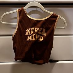 Never Worn No Brand Listed Super Cheap Price Trendy Brown Cotton Tank Top, Brown Letter Print Top For Summer, Sporty Brown Top For Spring, Sporty Brown Tops For Spring, Trendy Brown Tops With Text Print, Sporty Brown Tops With Graphic Print, Brown Sporty Tops With Letter Print, Sporty Brown Tops With Letter Print, Never Mind