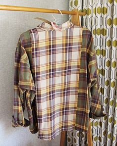 Quilt patch inspired details & the cutest plaid! We love this shirt with its button up front, fringe hem & cute front pockets. Oversized cute fit for a laid-back vibe. 100% soft brushed cotton. Color: Multi Hand wash cold Small Medium Large Bust 40 43 46 Waist 40 43 46 Hips 41 42 45 Length 22 22 23 Bust, waist, and hip measurements are a total circumference. Length is measured from the top of the shirt to the hem. Measurements are an estimate. Fall Shirt With Shirttail Hem For Everyday, Everyday Shirt With Shirttail Hem For Fall, Everyday Fall Shirt With Shirttail Hem, Shirt With Shirttail Hem For Everyday Fall, Yarn-dyed Button-up Tops For Fall, Plaid Button-up Tops, Yarn-dyed Long Sleeve Fall Shirt, Yarn-dyed Long Sleeve Shirt For Fall, Fall Season Yarn-dyed Button-up Tops