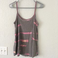 This Is A Soft Fabric, Loose Tank Top From We The Free (Free People Brand). Never Worn. Gray With Hot Pink And Light Yellow. Size Xs Pink Spring Tank Top For Loungewear, Pink Cotton Scoop Neck Tank Top, Pink Scoop Neck Cotton Tank Top, Pink Scoop Neck Top For The Beach, Pink Tank Top For Day Out, Multicolor Casual Tank Top For Loungewear, Casual Multicolor Tank Top For Loungewear, Multicolor Tank Top For Summer Loungewear, Pink Cotton Tank Top For Vacation