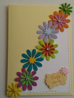 a greeting card with colorful flowers on it