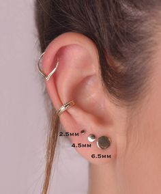 14K SOLID GOLD round SINGLE stud earring Perfect for a variety of piercing locations:  nostril / lobe / 3rd, 2nd hole earring / tragus / conch / helix / cartilage  ---> Features: ♦ Material: 14k SOLID GOLD yellow/rose ♦ Please choose the wearing surface of your stud:  1mm - (not available for 16 gauge / 1.2mm) 1.5mm  2.5 mm  3.5 mm  4.5 mm  6.5 mm  8.5 mm  ♦ Wire thickness:  Select your preference in the gauge at the top right of this page. available in 16/18/20/22 gauge = 1.2/1/0.8/0.6 mm.  Gau Tiny 14k Gold Huggie Earrings, 14k Gold Ear Climbers For Everyday, 14k Gold Huggie Ear Climbers, 14k Gold Pierced Round Ear Cuff, 14k Gold Round Piercings For Anniversary, Dainty 14k Gold Ear Climbers For Pierced Ears, Yellow Gold Minimalist Ear Cuff, Hypoallergenic 14k Gold Ear Climbers, Yellow Gold Round Ear Cuff