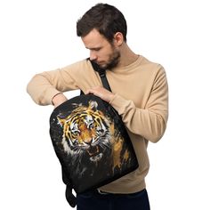 If you feel like you're carrying half of your belongings with you at all times, this Minimalist Backpack/Bookbag with a Tiger Cat Design is for you! It has a spacious inside compartment (with a pocket for your laptop), and a hidden back pocket for safekeeping your most valuable items. * Made from 100% polyester * Fabric weight: 9.56 oz/yd² (325 g/m weight may vary by 5% * Dimensions: 16.1″ (41 cm) in height, 12.2″ (31 cm) in width, and 5.5″ (14 cm) in diameter * Capacity: 5.3 gallons (20 l) * Ma Rectangular Backpack With Cat Design For Back To School, Rectangular Cat Design Backpack For Back To School, Back To School Rectangular Backpack With Cat Design, Back To School Backpack With Cat Design, Black Backpack With Cat Design, Cat Design Standard Backpack For Daily Use, Daily Use Standard Backpack With Cat Design, Daily Use Cat Design Standard Backpack, Travel Backpack With Cat Design