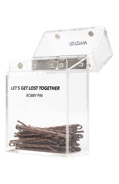 What it is: A case of 50 bobby pins in an acrylic case with a convenient magnetic closure.What it does: This pack of bobby pins comes in three different colors to match your hair. The acrylic, magnetic case makes sure no bobby pin gets lets behind. Acrylic/magnetic Imported Aesthetic Hair Clutcher, Hair Clips Cute Bobby Pins, Blonde Bobby Pins, Bobby Pin Container, Pin Storage, Silver Bobby Pins, Pin Box, Lost Hair, Bobby Pin