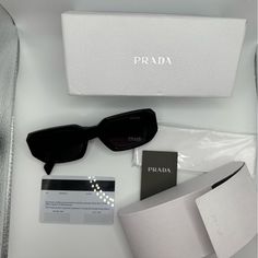 Prada Color - Black High Quality, Inventiveness, And A Solid Legacy Of Workmanship Are Hallmarks Of This World-Renowned Fashion Leader's Signature Style. The Subtle Aesthetic Of Prada Has Always Foreshadowed And Frequently Set Trends In Fashion. Prada Sunglasses Combine The Best Materials Available To Create The Perfect Harmony Between Style And Functionality. These Sunglasses Are Ideal For Ladies Who Like To Give Their Ensemble A Hint Of Refinement. For Every Event, Including A Night Out With F Prada Products Aesthetic, Designer Sunglasses Aesthetic, Prada Sunglasses Aesthetic, Prada Sunglasses Women, Prada Pr 17ws, Luxury Sunglasses Women, Subtle Aesthetic, Prada Aesthetic, Prada Gifts