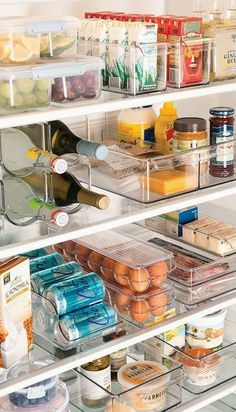 a refrigerator filled with lots of food and condiments on it's shelves