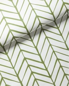 a white and green wallpaper with an abstract pattern on it's surface,