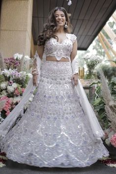 Ivory attached cancan lehenga with mix of lavender stones, crystals, silver sequins and pearls embroidery. Paired with a padded blouse with similar hand embroidery work and dupatta with embroidered border. - Aza Fashions Lavender Sharara With Intricate Embroidery For Wedding, Lavender Embroidered Sharara For Wedding, Lavender Sharara With Intricate Embroidery For Reception, White Hand Embellished Choli For Reception, White Hand Embellished Fitted Sets, Fitted White Hand Embellished Sets, White Fitted Hand Embellished Sets, Fitted Hand-embellished White Sets, Wedding Embellished White Sharara