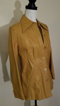 Vintage World Knits Womens size 14 Jacket Coat 1970s Butterfly collar tan. Condition is Pre-owned. Shoulder to shoulder 16". Armpit to armpit 18". Back of collar to bottom hem 28 3/4". Sleeve 22 1/2" Some small stains but in great condition. Stain on inside lining. Made in British Crown Colony of Hong Kong. 100% Poly Vinyl Chloride with 100% cotton backing. Hand wash surface with mild soap and water only. Wipe clean only. Like all vintage clothes, sizes run smaller than today. From smoke free ho 1970s Coat, 70s Jacket, Clothes Sizes, Outfit References, Blazer Style, Vintage Clothes, Blazer Fashion, The Butterfly, Mild Soap