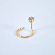 "Dainty genuine diamond nose pin, hand crafted in 14k solid gold, these C & L wire studs are perfect for any occasion. An intrinsic part of your everyday, they can be worn in multiple types of piercings. * Diamond Wt : 0.01ct to 0.10ct (for bigger sizes please message) 1) - 0.01 ct (1.4 mm) 2) - 0.02 ct (1.7 mm) 3) - 0.03 ct (1.9 mm) 4) - 0.04 ct (2.1 mm) 5) - 0.05 ct (2.3 mm) 6) - 0.06 ct (2.5 mm) 7) - 0.07 ct (2.6 mm) 8) - 0.08 ct (2.7 mm) 9) - 0.09 ct (2.8 mm) 10) - 0.10 ct (2.9 mm) MODEL Dainty Prong Setting Nose Studs As Gifts, Yellow Gold Piercings With Diamond Accents For Gift, 14k Gold Nose Studs With Prong Setting Gift, 14k Gold Prong Setting Nose Studs For Gift, Yellow Gold Nose Rings With Prong Setting, Dainty Nose Rings With Prong Setting As Gift, Yellow Gold Nose Studs With Prong Setting For Gift, Gift Diamond Accented Round Piercings, Yellow Gold Nose Studs With Prong Setting