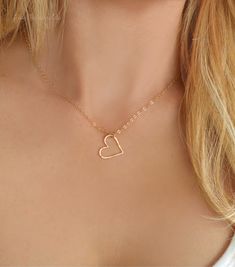 "Pretty and Dainty Hammered Floating Heart Necklace~ 100% Sterling Silver, 14k Gold Fill or Rose Gold Fill The perfect gift to represent the one you love! - Dainty heart measures approx 15mm - Chain is a sparkly rose gold fill, sterling silver or 14k gold fill - Heart can be worn different directions! - Model is shown wearing a 16\" chain and has a size small neck - Necklace closes with a spring clasp - This item is hand crafted, made to order, and packaged for you SIZING INFO The model pictured Heart Shaped Charm Necklaces For Weddings, Dainty Heart-shaped Jewelry For Anniversary Gift, Delicate Heart-shaped Jewelry For Anniversary Gift, Delicate Heart-shaped Jewelry For Anniversary, Delicate Open Heart Jewelry For Anniversary Gift, Delicate Chain Jewelry For Valentine's Anniversary, Dainty Open Heart Jewelry For Anniversary Gift, Open Heart Necklaces For Wedding, Open Heart Necklace For Anniversary