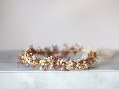 A whimsical flower crown in beautiful tones of beige, brown ang burgundy. Thanks to the use of dried flowers and artificial leaves, the crown is durable. Dried baby breath adds lightness to the composition. It is a special touch to your bohemian look. A flower crown is more beautiful than the pictures. Is perfect for garden wedding. Head circumference: one size fits all (adjustable) / fits adults and older children If the crown should fit the baby, after buying please give head circumference We Dainty Flower Crown, Vintage Flower Crown, Dried Baby Breath, Dried Flower Crown, Whimsical Flower, Artificial Leaves, Baby Breath, Flower Comb, Artificial Leaf