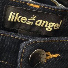 there is a label that says like an angel on the back of a pair of jeans