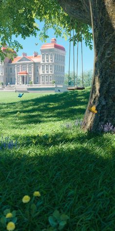 a large white house sitting on top of a lush green field next to a tree