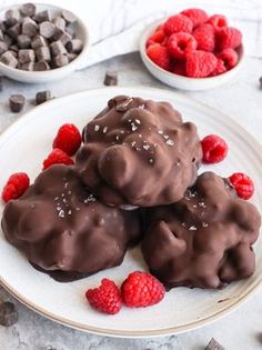 chocolate covered raspberries on a white plate