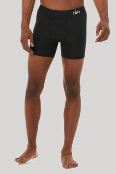 An ultralight performance-engineered essential for workout and beyond. The Hero Underwear has a snug, smooth, supportive fit, lay-flat elastic waistband and move-with-you 4-way stretch, in a classic boxer brief length. Made with our ultra-soft quick-dry triblend jersey. Boxer brief length Snug, smooth fit Lightweight support Comfortable elastic waistband Alo Yoga, Boxer Briefs, Swim Trunk, Lay Flat, Quick Dry, Yoga, Elastic, Black