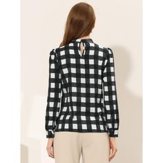 As a classy and elegant appeal, this bow tie-neck shirt will always be timeless. This elegant blouse comes in a classic style featuring a bow-tie neck, long sleeves, and vintage check prints that make your figure look polished! This blouse would make you charming and flattering, featuring a classy tie-bow that makes you special in the office. This office blouse is suitable for spring, summer, autumn, casual outings, office, work, leisure, formal, and daily wear. Classic Tie Neck Top With Bow, Classic Tops With Bow For Work, Classic Bow Tops For Workwear, Classic Long Sleeve Blouse With Bow, Classic Workwear Tops With Bow Detail, Classic Workwear Tops With Bow, Workwear Bow Tie Neck Blouse, Tie Neck Bow Tie Blouse For Work, Elegant Bow Tie Blouse For Work