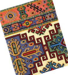 a colorful rug with many different designs on it