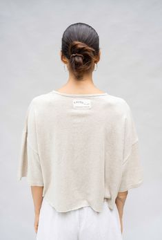 This relaxed-fit cropped tee features a wide neckline, complemented by an external label on the back for added style. Crafted from lightweight and breathable hemp cotton fabric with a unique slub texture, it softens with every wash. Comfortable Cotton Drop Shoulder Tops, Comfortable Drop Shoulder Cotton Tops, Boxy Crop Top Casual, Oversized Casual Crop Top, Loose Fit Cotton Crop Top For Loungewear, Boxy Drop Shoulder Tops For Summer, Oversized Cotton Crop Top Casual, Boxy Drop Shoulder Summer Tops, Oversized Cotton Casual Crop Top