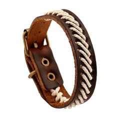 a brown leather bracelet with white braiding