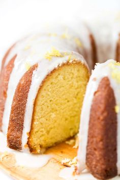 a bundt cake with white icing and lemon drizzled on top