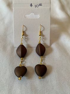 dark brown and gold dangle earrings Cheap Brown Jewelry With Dangling Beads, Cheap Traditional Brown Jewelry, Elegant Brown Chandelier Earrings, Elegant Brown Metal Jewelry, Handmade Brown Dangle Chandelier Earrings, Elegant Brown Metal Beaded Earrings, Elegant Brown Beaded Dangle Earrings, Elegant Brown Beaded Earrings, Adjustable Brown Drop Earrings