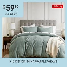 a bed with blue sheets and white pillows on it is shown for $ 59 99