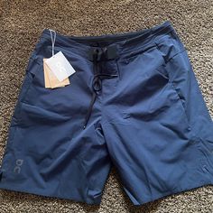 New Never Worn Men’s Shorts Blue Athleisure Shorts For Outdoor Activities, Blue Athleisure Shorts For Outdoor, Navy Functional Shorts, Blue Stretch Shorts For Outdoor, Blue Bottoms With Built-in Shorts For Outdoor, Blue Athletic Shorts With Pockets For Outdoor, Blue Athletic Shorts With Pockets, Blue Short Bottoms For Outdoor, Blue Athletic Shorts With Built-in Liner For Outdoor