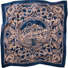 a blue bandana with an image of mountains and trees in the center, on a white background