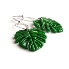 Monstera Leaf Earrings.The size of a leaf is about 1.4 inches (3,5 cm),Length of earrings is about 2.5 inches (5,5 cm).Materials: polymer clay, stainless steel earrings.Other earrings you can see here: https://www.etsy.com/shop/RinaStudioDesign?section_id=24005662• Submersion in water is not recommended for polymer clay as this will quickly deteriorate the product. It is recommended that you remove the earrings prior to swimming or showering to extend the life of the product.• Due to the handmad Green Minimalist Pierced Earrings, Minimalist Green Pierced Earrings, Handmade Leaf-shaped Earrings, Leaf-shaped Earrings For Gift, Nickel-free Leaf-shaped Nature-inspired Earrings, Trendy Leaf-shaped Earrings For Gifts, Hypoallergenic Leaf-shaped Nature-inspired Jewelry, Green Leaf-shaped Sterling Silver Earrings, Leaf-shaped Jewelry Gift