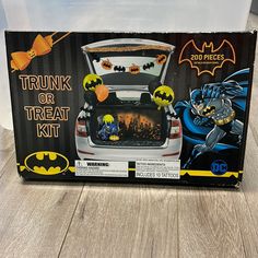 batman trunk or treat kit for kids in the shape of a car with batgirls on it