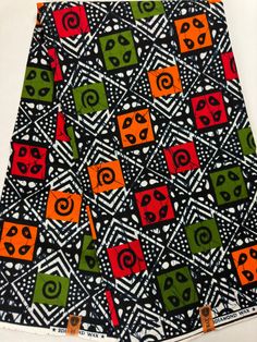 "Material: 100% cotton Top QUALITY FABRIC Print: DOUBLE-sided  Width: 46\" This timeless appeal & adorable African print is perfect for making African Clothing, African Quilts, Upholstery, Home Décor, and unique accessories. FABRIC CUT:        Purchase of 1+ yards per customer will be cut as 1 continuous  piece of fabric up to a maximum length of 6 yard. LABELS: All African fabric is sold with an adhesive Manufacturer label attached. Create your unique one of a kind piece. Get it today.  Each pi Fitted Multicolor Digital Print Cotton Tops, Traditional Patterned Cotton Fabric For Festivals, Multicolor Cotton Digital Prints With Printed Motifs, Multicolor Cotton Digital Prints With Motifs, Multicolor Cotton Digital Prints, Cotton Digital Prints With All Over Pattern, Multicolor Cotton Batik Print Patterns, Multicolor Cotton Fabric For Festivals, Cotton Batik Print Fabric