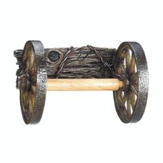 an old fashioned wooden toy with wheels and rope on it's sides, against a white background