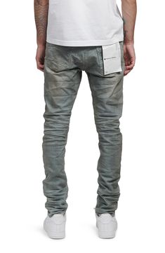 Ripped knees and raw hems lend laid-back style to these skinny jeans enhanced with a bit of stretch to move with you. 13" leg opening; 11" front rise; 14 1/2" back rise 98% cotton, 2% Lycra® spandex Machine wash, line dry Imported Asian Owned/Founded Streetwear Fitted Jeans With Frayed Hem, Urban Fitted Jeans With Frayed Hem, Fitted Jeans With Frayed Hem For Streetwear, Slim Fit Zip Fly Jeans For Streetwear, Slim Fit Jeans With Zip Fly For Streetwear, Stretch Jeans With Zip Fly For Streetwear, Stretch Washed Jeans For Streetwear, Purple Jeans Outfit Men, Atl Fits