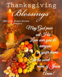 a thanksgiving greeting with pumpkins, cornucts and candles