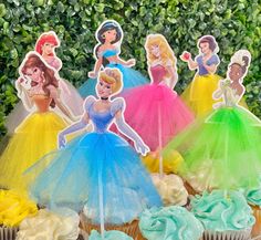 there are cupcakes with princesses on them