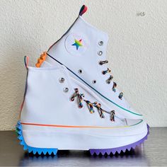 Converse Run Star Hike High Platform Shoes "Pride.” This Pair Showcases A Colorful Palette That Brings A Pop Of Color To Your Outfit. Condition: New Color: White/Multi Style Code: 170824c Available Sizes: Women’s 4.5 = Men's 3 Women’s 5.5 = Men’s 4 The Iconic Converse Chuck Taylor All Star High Top Gets Reimagined In The Run Star Hike. Lace-Up Canvas Keeps It Classic From The Front, While A Contrast-Color Star On The Heel Defines The Modern Platform Style. With Ortholite Cushioning And Color-Blocking To Draw Attention To The Statement, Saw-Tooth Outsole. Please Note: New With Box No Lid Will Be Packaged With Care! Hightop Platform Converse, Converse All Star Lugged, Converse One Star Platform, Platform Tennis Shoes, High Platform Shoes, High Top Chucks, Converse Run Star Hike, Rainbow Sneakers, Converse Run