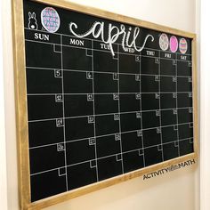 a blackboard with calendars on it and the word april written in chalk