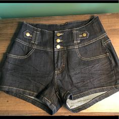 New Without Tags. High Waisted Dark Denim Shorts With Triple Button Up Closure. Never Worn, Perfect Condition. Originally Purchased From Papaya. Smoke Free Home. Grunge High Waist Dark Wash Shorts, Dark Wash Buttoned Jean Shorts, Grunge High-waist Dark Wash Shorts, Dark Jean Shorts, Dark Wash Denim Grunge Jean Shorts, Grunge High-waist Jean Shorts With Built-in Shorts, High Wasted Shorts, Dark Denim Shorts, Types Of Shorts