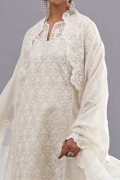 Buy Off White Kurta And Dupatta Floral & Sequins Straight Pant Set For Women by KORA Online at Aza Fashions. Elegant Sets With Sheer Dupatta For Traditional Ceremonies, Elegant Sharara With Sheer Dupatta For Traditional Ceremonies, White Chanderi Sharara With Straight Kurta, White Cotton Silk Sets For Diwali, Elegant Unstitched Suit With Long Sleeve Lace Work, Elegant Mulmul Sharara For Festivals, White Silk Dupatta With Cutdana, Elegant Anarkali Set With Sheer Dupatta For Traditional Ceremonies, White Mulmul Sets For Diwali